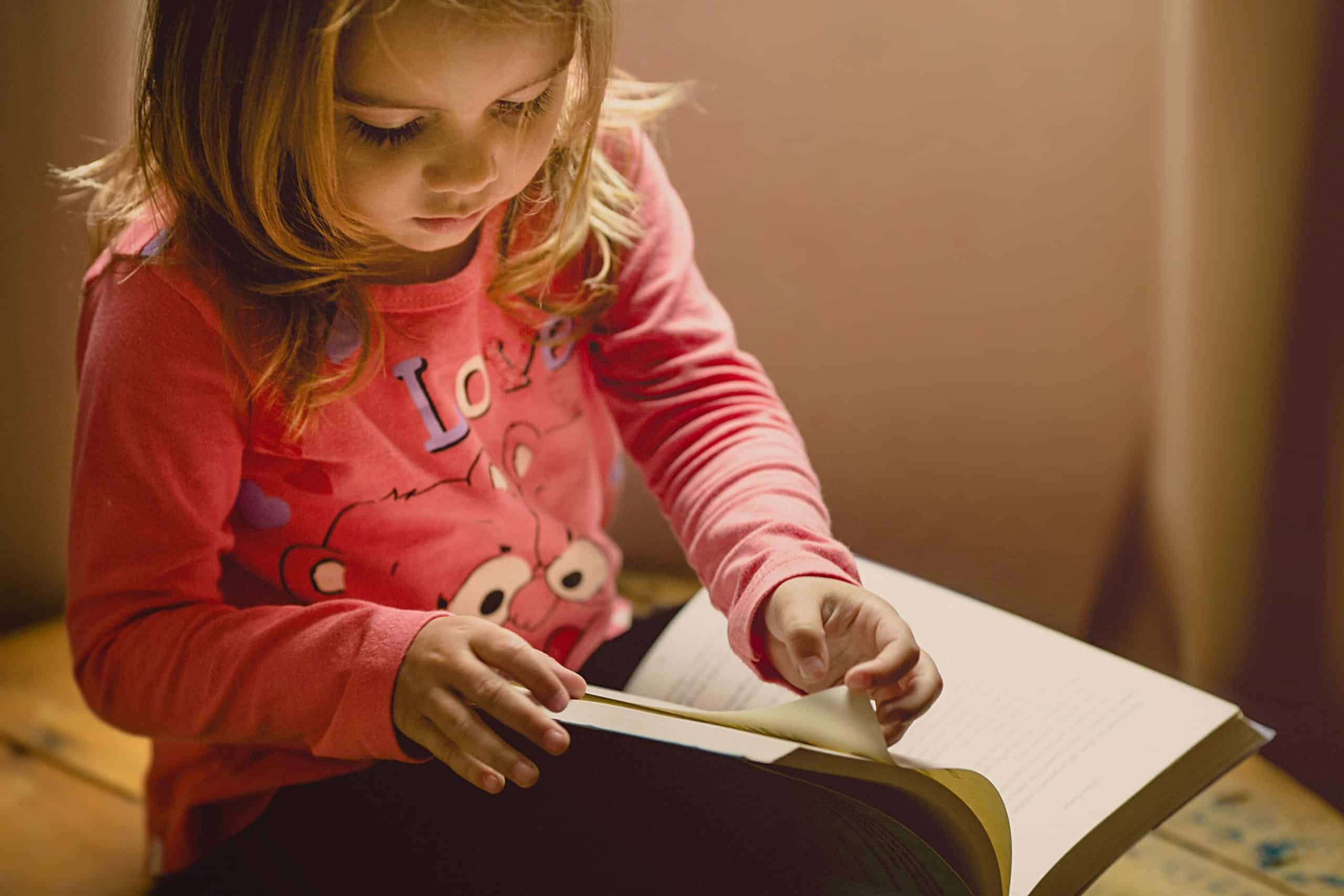 Transformative Bible Studies for Families: Building Faith Together - photo kid reading the bible